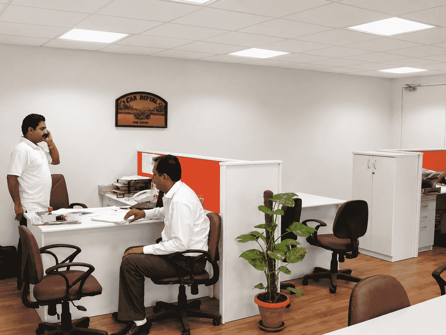 Engineers working inside an insulated prefab site office